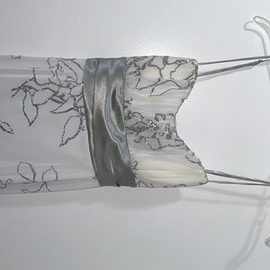 Brand is speechless. White with beautiful  glitter pattern. Size 11.